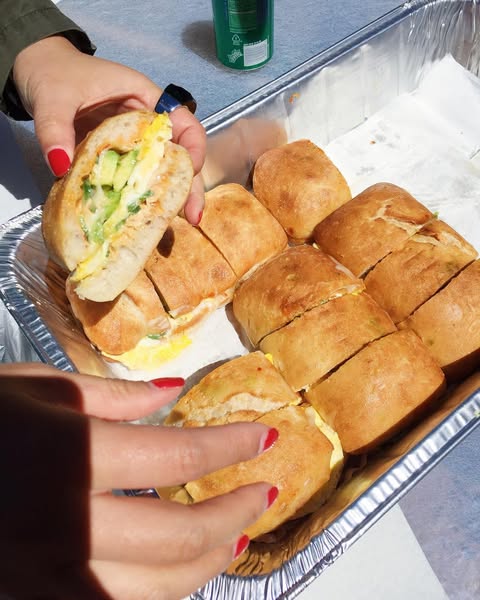 Tray of Breakfast Basile sandwiches outdoors