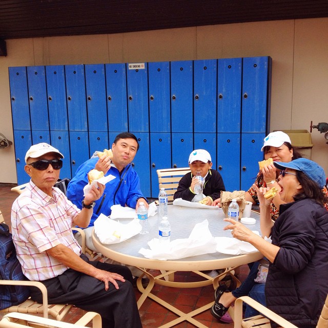 Family enjoying Breakfast Basile at picnic table