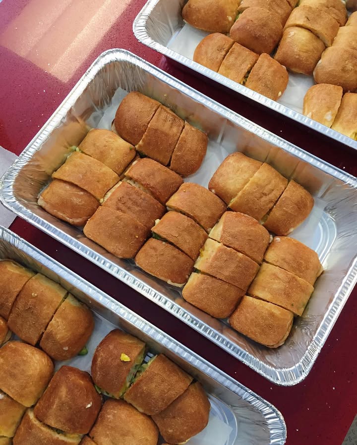 Multiple trays of Breakfast Basile sandwiches